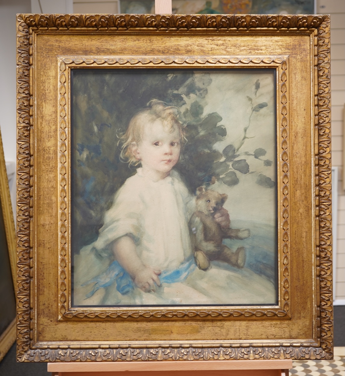 Ambrose McEvoy ARA, (1878-1927), Portrait of a child holding a teddy bear